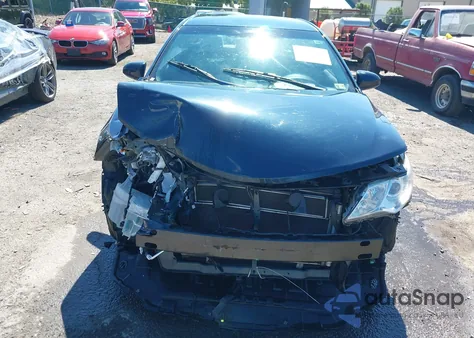 2014 Toyota Camry Hybrid Le z USA, uszkodzony, nr VIN 4T1BD1FK7EU110325